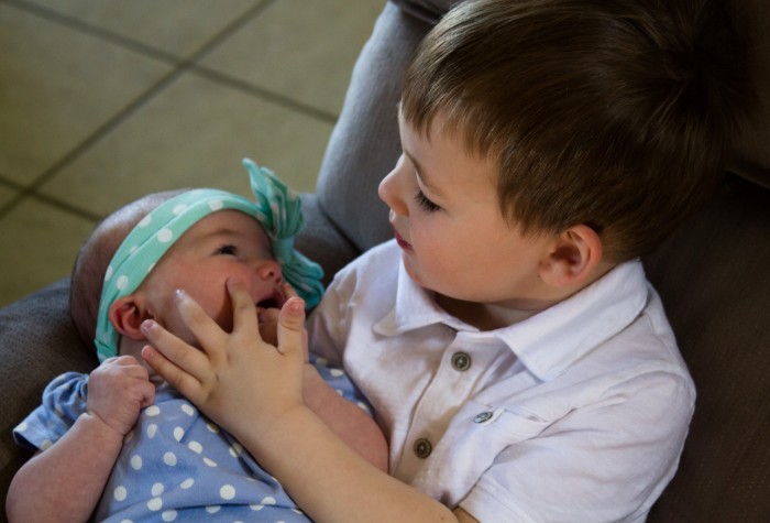 Eli helping Maisie get prepped